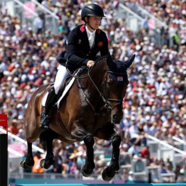 Great Britain won its first gold medal as a nation by defending its Olympic team eventing title at the Paris games