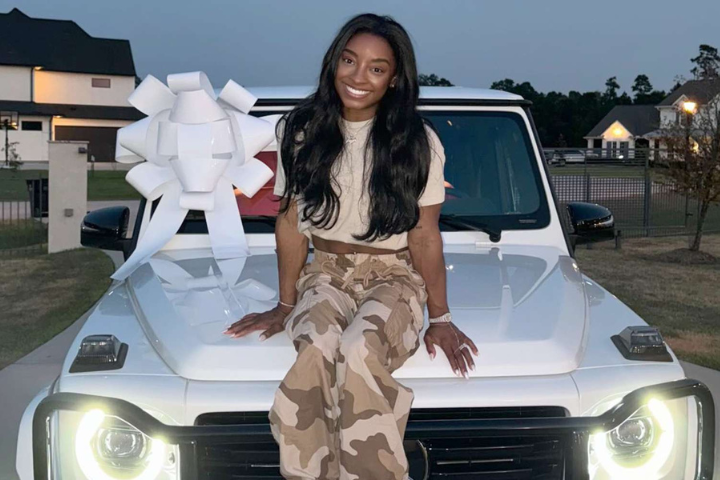 Simone Biles Poses With Her New White G-Wagon