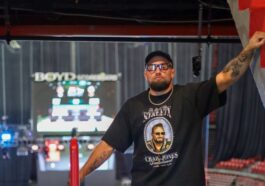 Craig Jones kisses Gabi Garcia before their CJI match