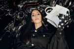 Kim Kardashian Ices Back in Leather Outfit