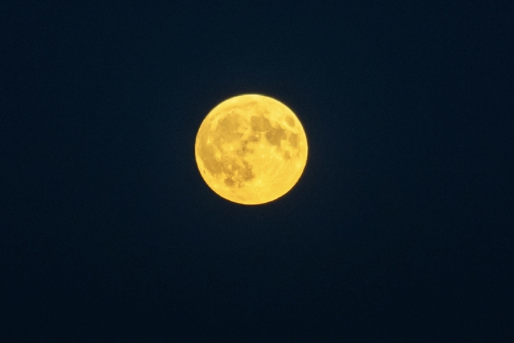 Experience the Full Harvest Supermoon and Partial Lunar Eclipse