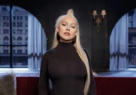 Christina Aguilera shows off her orange Halloween outfit