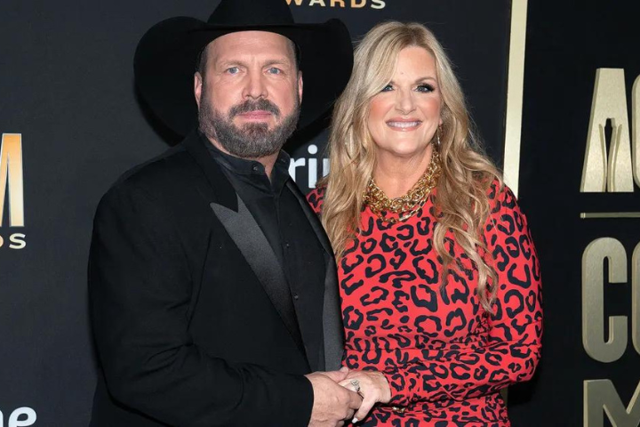 Trisha sells mansion day before Garth gets sued