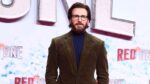 Chris Evans Unveils Scruffy Look for “Red One” Promo